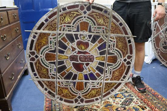 A set of eleven 19th century stained glass roundels, diameter 24in.